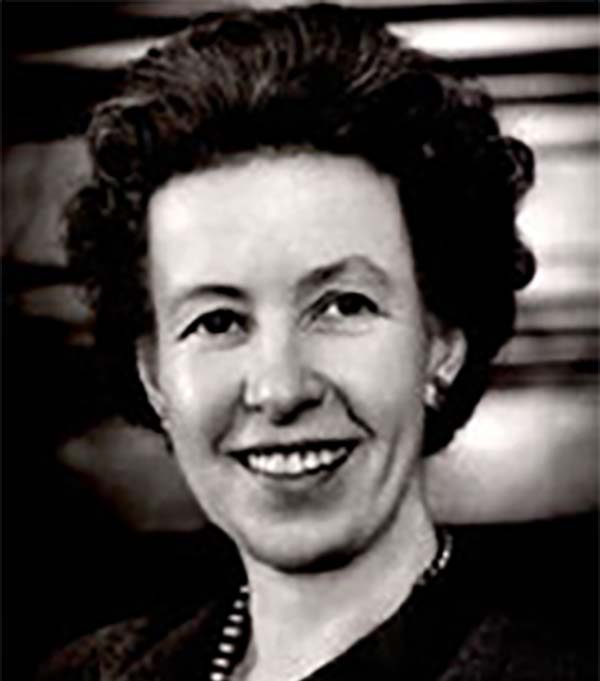 A black and white portrait of a white woman with short dark hair.